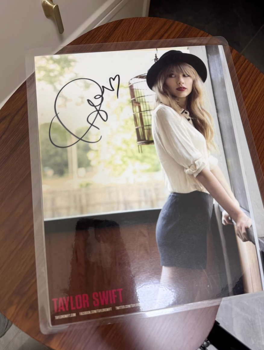 Taylor Swift signed poster from the 2012 *Red* era