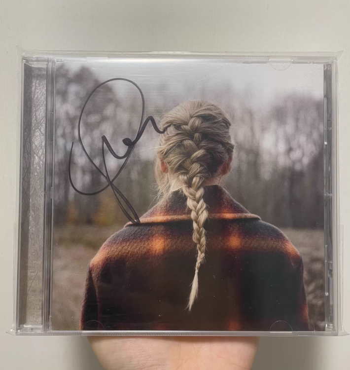 Taylor Swift - evermore Signed CD (“Drumstick” Signature, Opened with Sleeve)