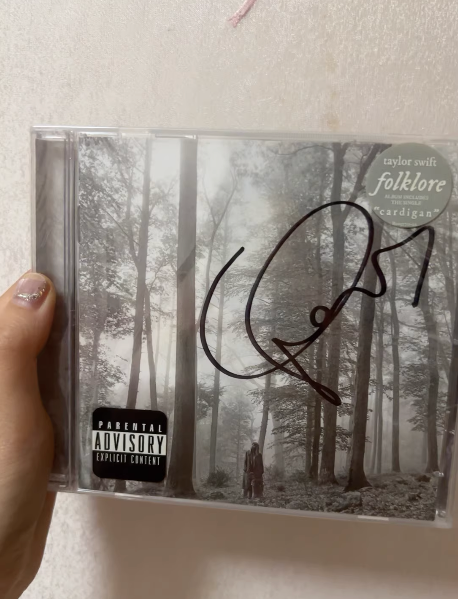 Taylor Swift – Folklore (Signed CD)   Signed CD edition of *Folklore*. Condition Mint (M): flawless, factory sealed, unplayed, with original stickers. Rare collectible.