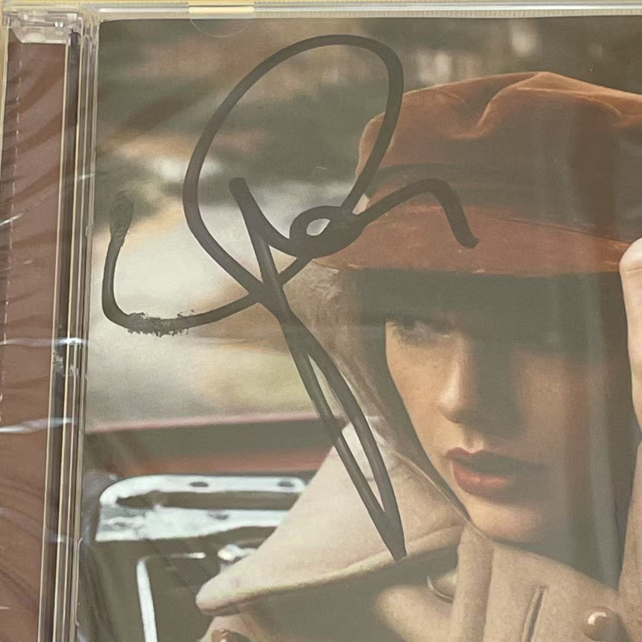 Taylor Swift - Red (Taylor's Version) Signed Album with Distinctive Signature