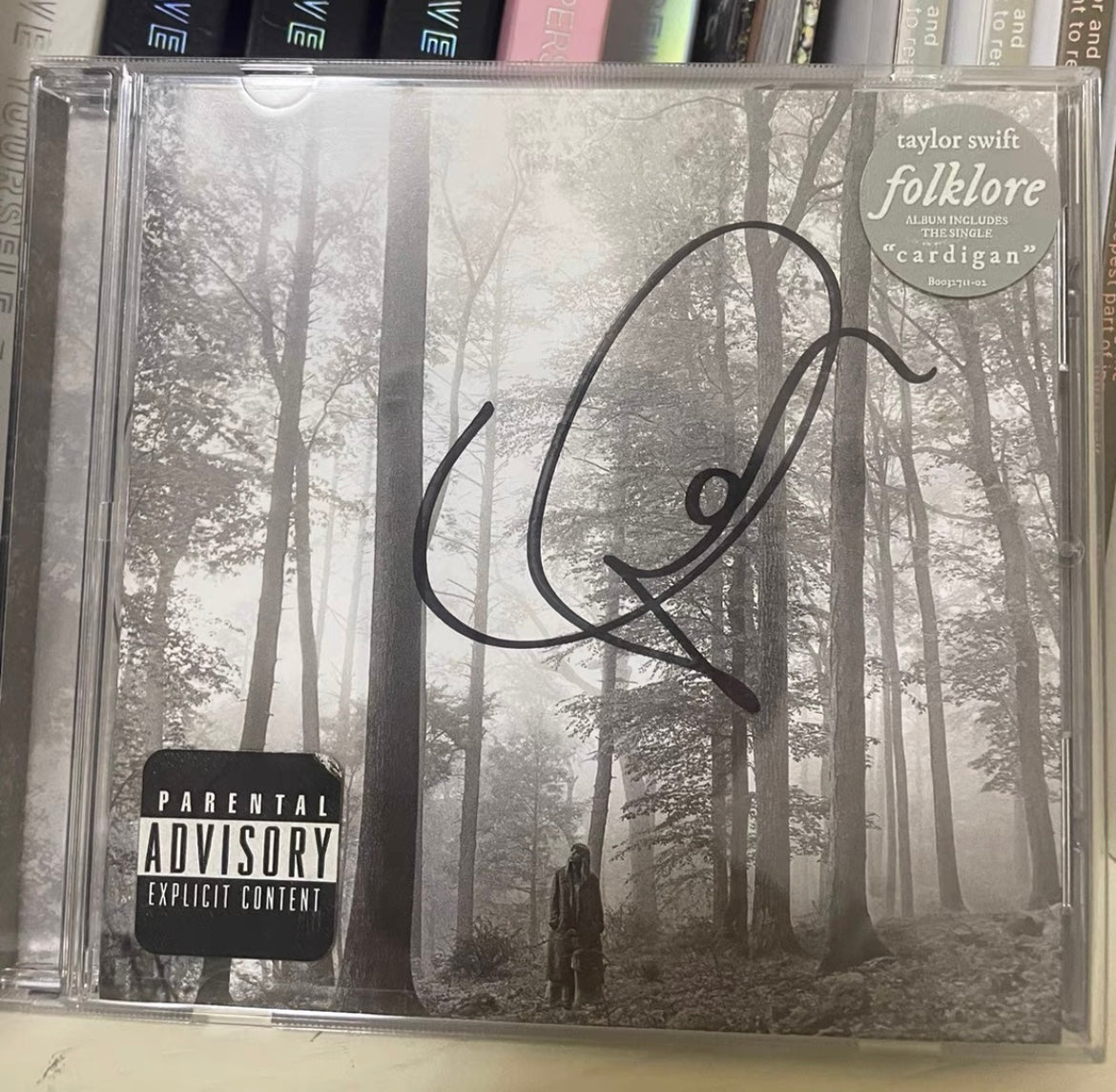 Taylor Swift Folklore signed CD (damaged sticker corner)