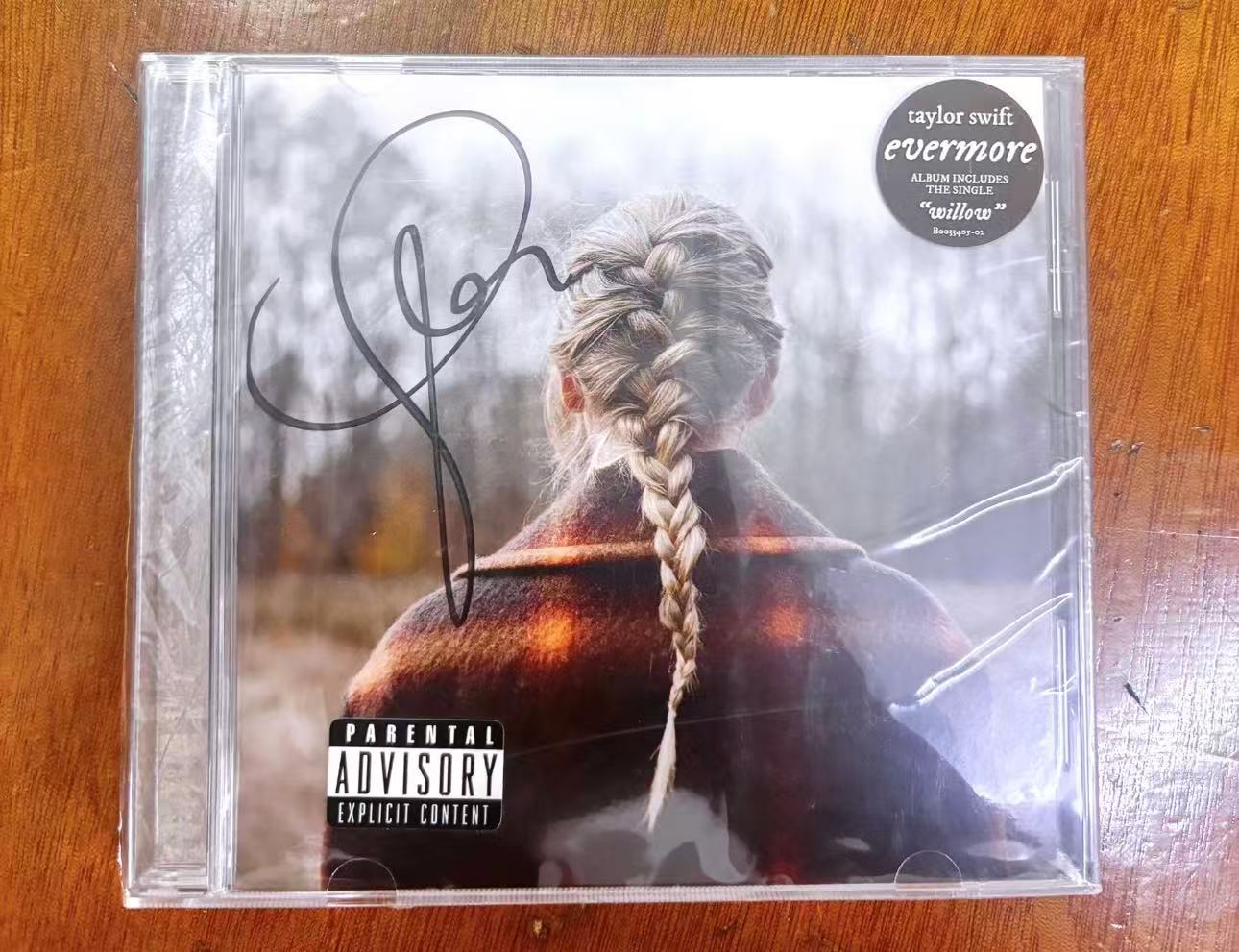 Taylor Swift evermore Autographed CD Sealed Minor Factory Shrink Scratches Read Desc