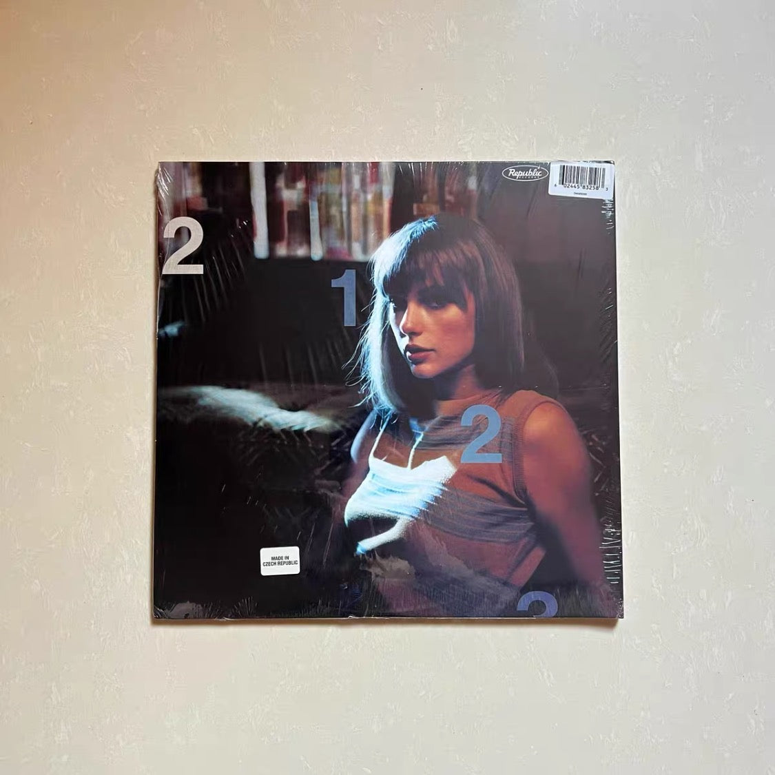 Authentic *Midnights* “Blue Moon” variant, hand-signed by Taylor Swift.