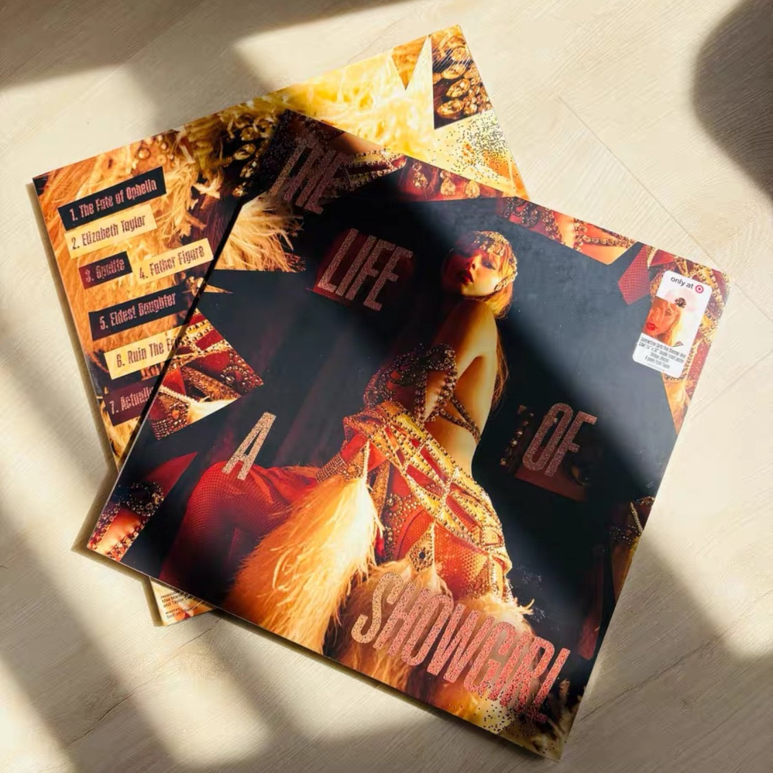 Taylor Swift Target Exclusive Pink Vinyl - The Life of a Show Girl
This appears to be a listing for:
	•	Taylor Swift vinyl record
	•	Target store exclusive
