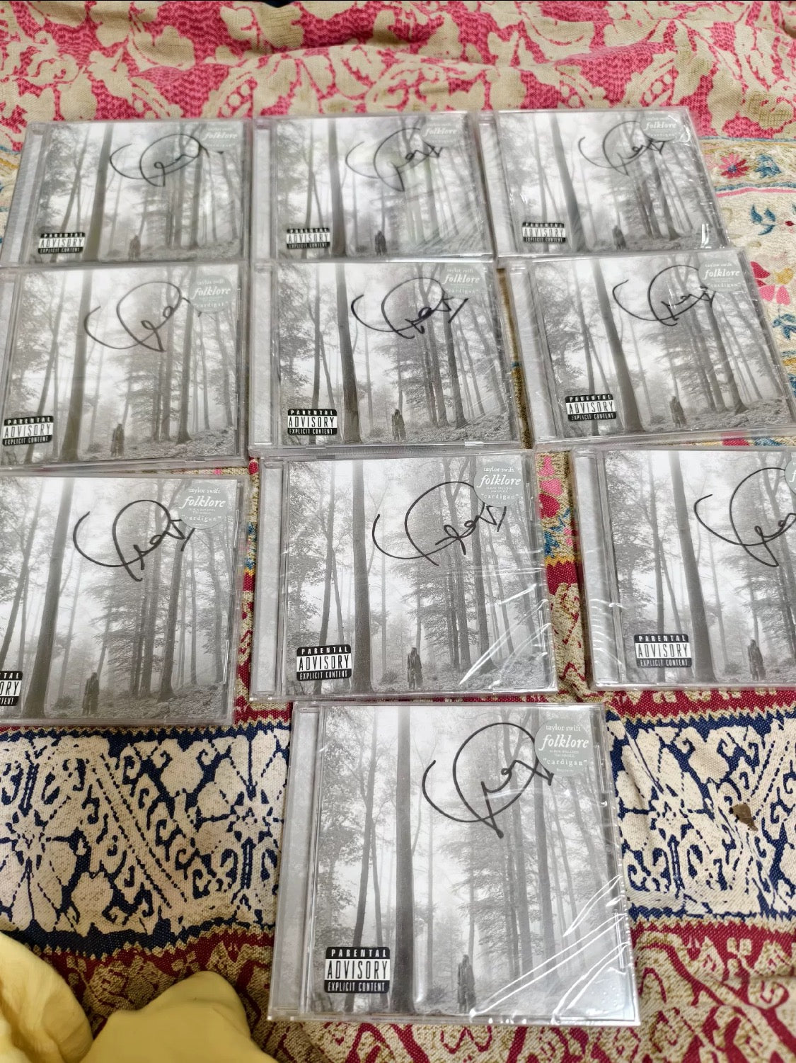 Sealed Taylor Swift *folklore* signed CD from 2nd batch, signed on shrink wrap, random signature variant.