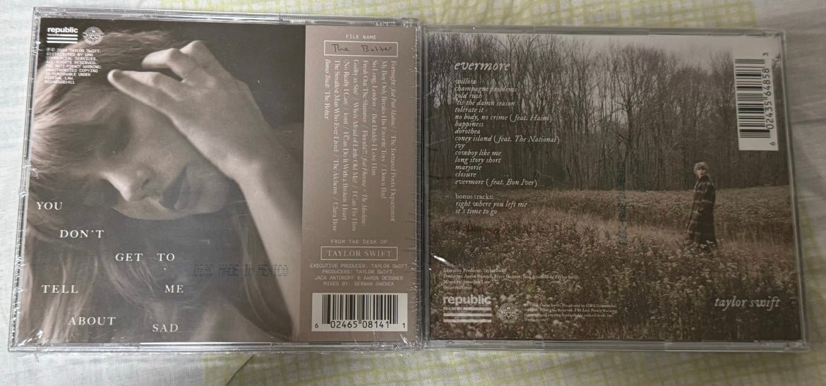 Taylor Swift Evermore Signed CD + TTPD Deluxe Version