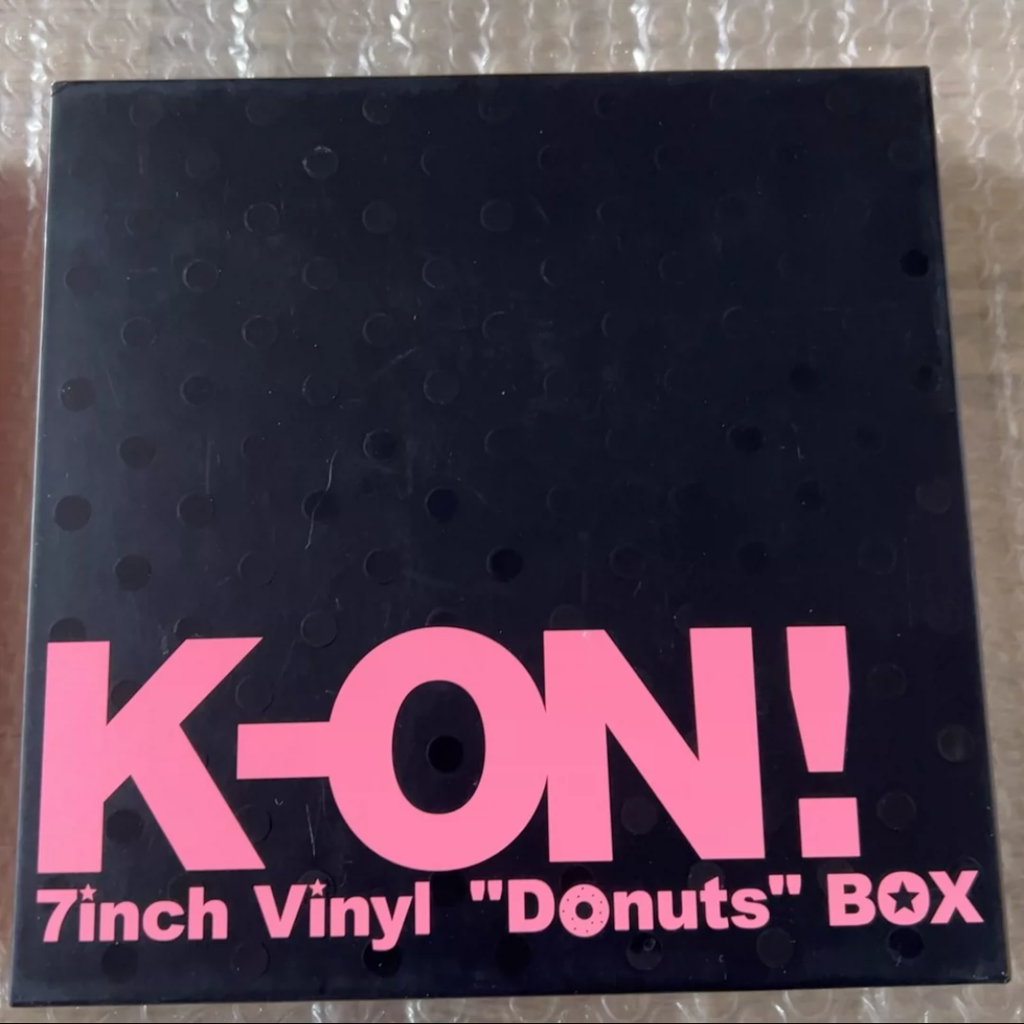 K-ON!! *Donuts* 7-inch vinyl box set, black box sealed, white box opened once, with minor outer wear.