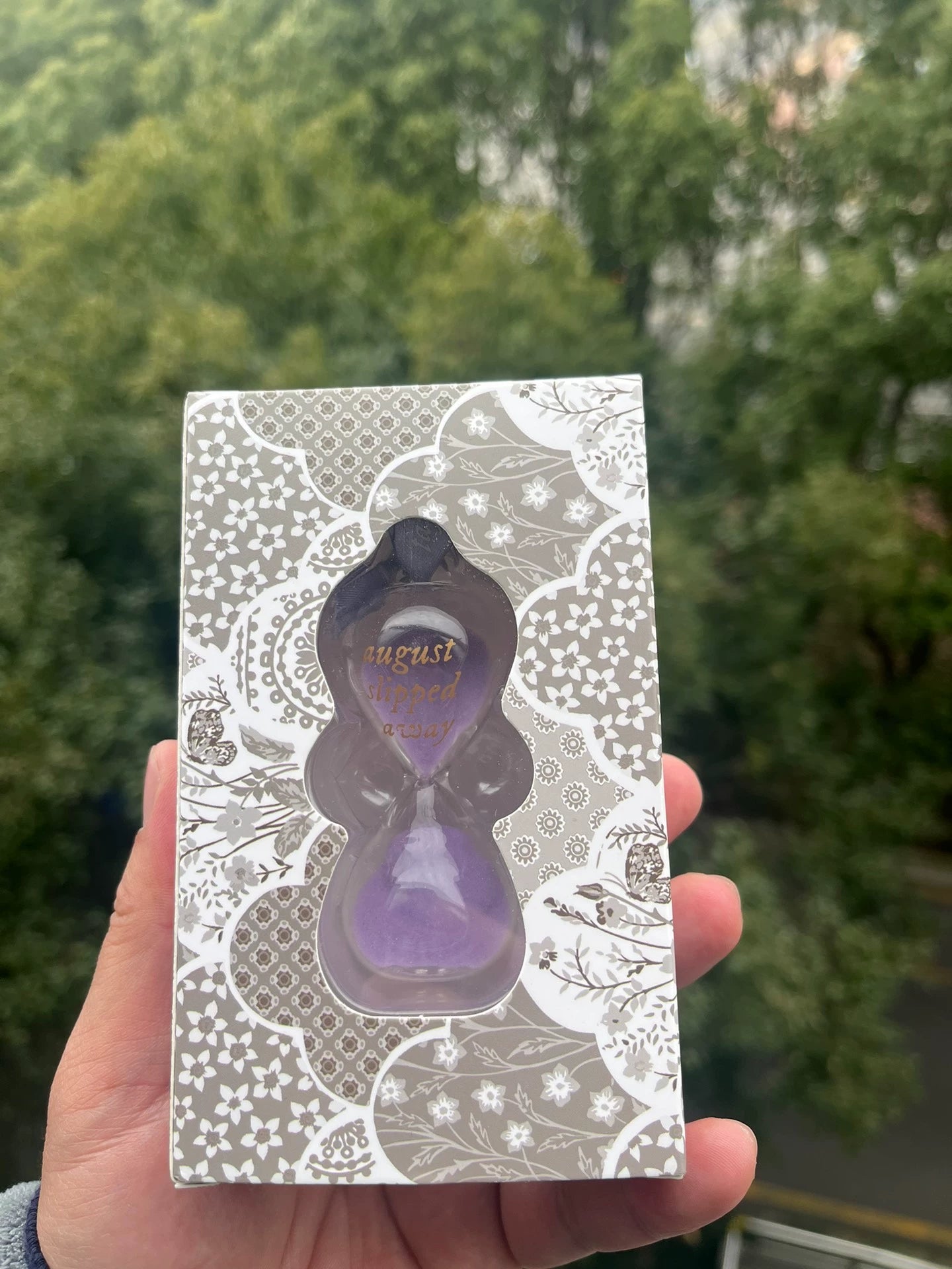 Official hourglass ornament packaging detail