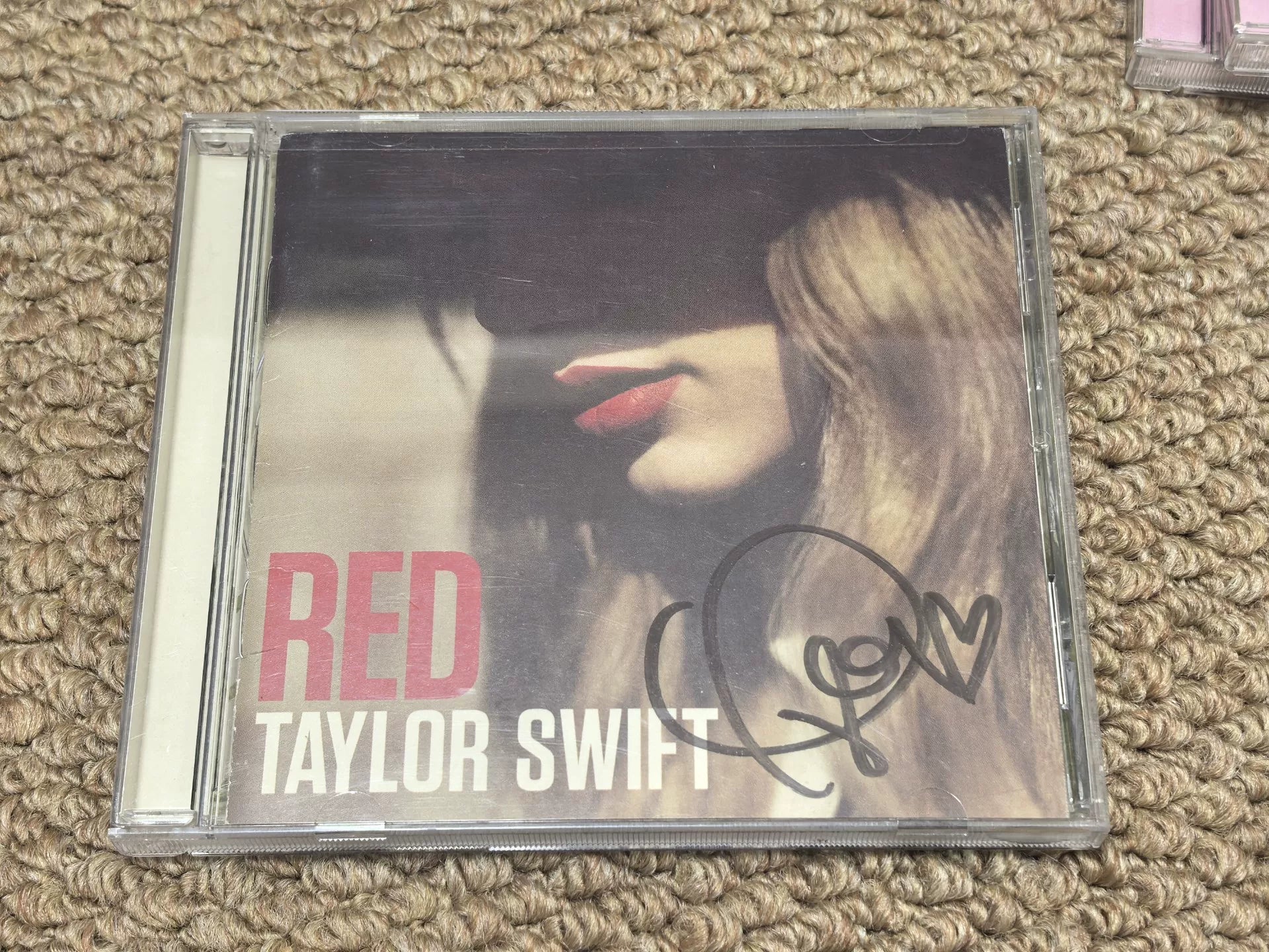 Taylor Swift – RED Signed Lyric Booklet with CD