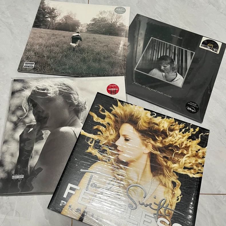 Taylor Swift – folklore Vinyl 3-Record Bundle + Opened Fearless Vinyl – actual product photo 1