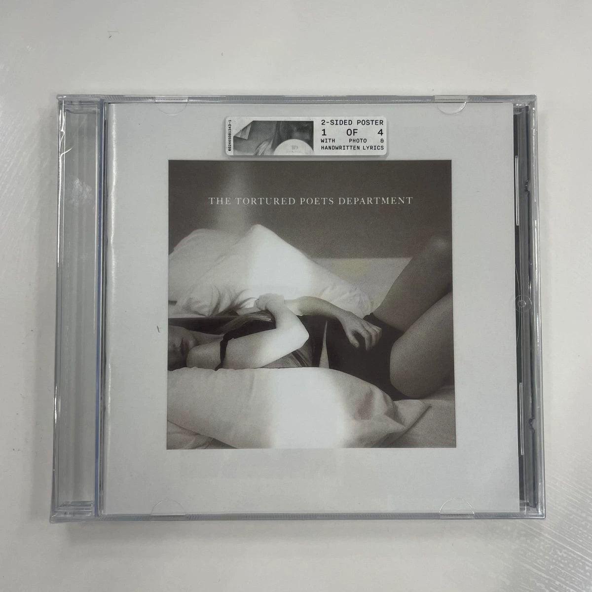 Taylor Swift — The Tortured Poets Department CD with Poster & Lyrics Book