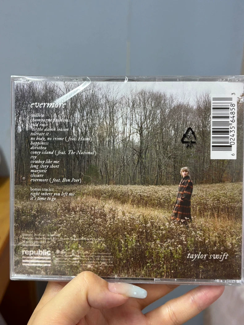 Taylor Swift – evermore Import CD – Like New – actual product photo 1