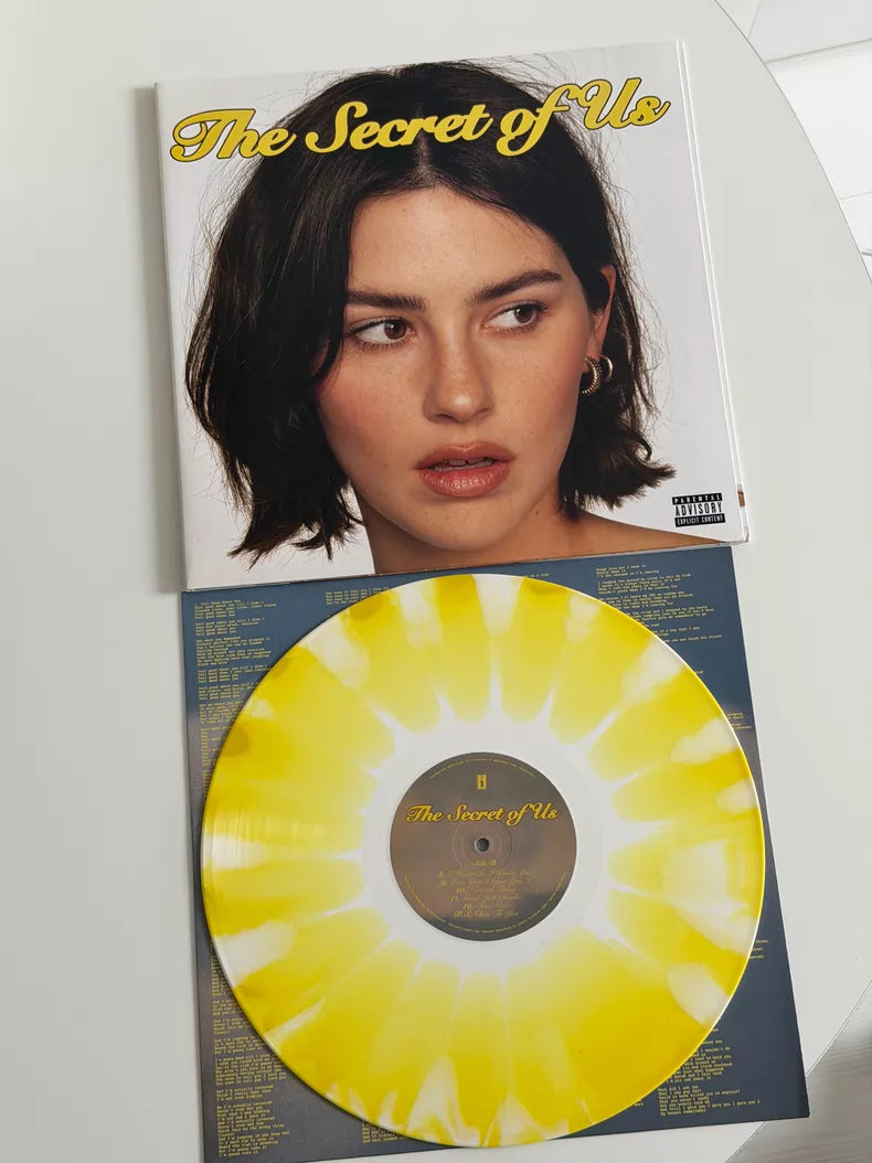 The Secret of Us numbered yellow vinyl detail