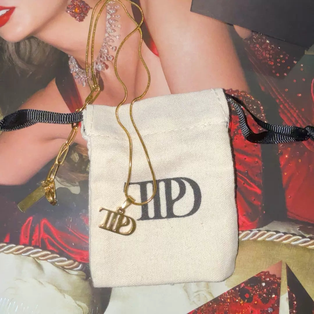 Taylor Swift – The Tortured Poets Department Logo Necklace – actual item photograph