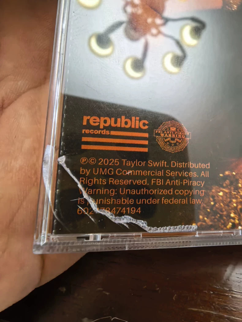 Taylor Swift – The Life of a Showgirl Standard Orange CD – Cracked Case, No Signed Card – actual product photo 1