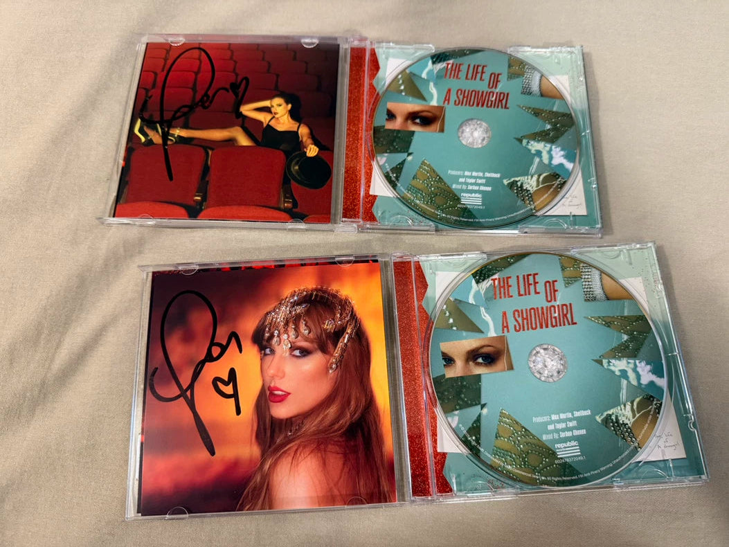Taylor Swift The Life of a Showgirl two signed CDs
