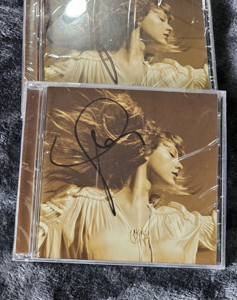 Fearless signed CD condition