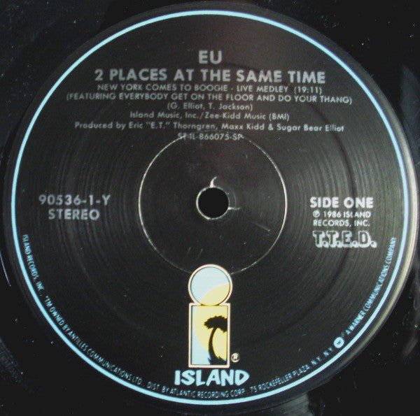 E.U. : 2 Places At The Same Time (LP, Album)