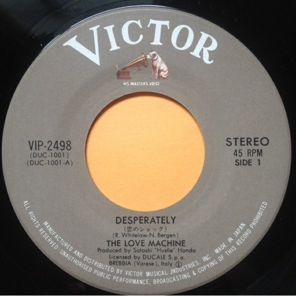 The Love Machine = The Love Machine : 恋のショック = Desperately (7")